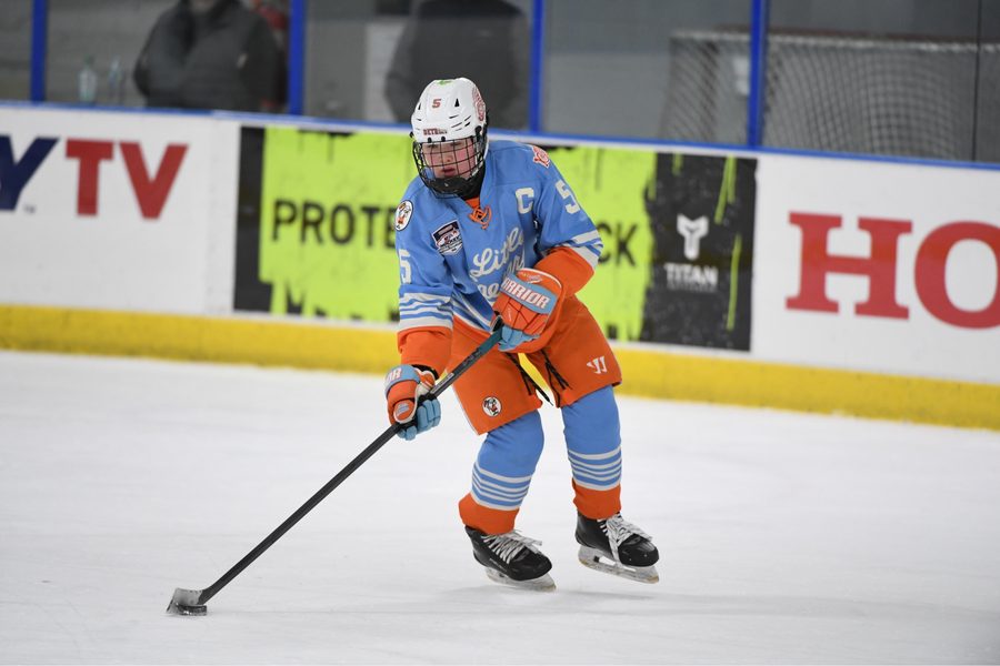 Cameron Cadena tracking the puck in the defensive zone