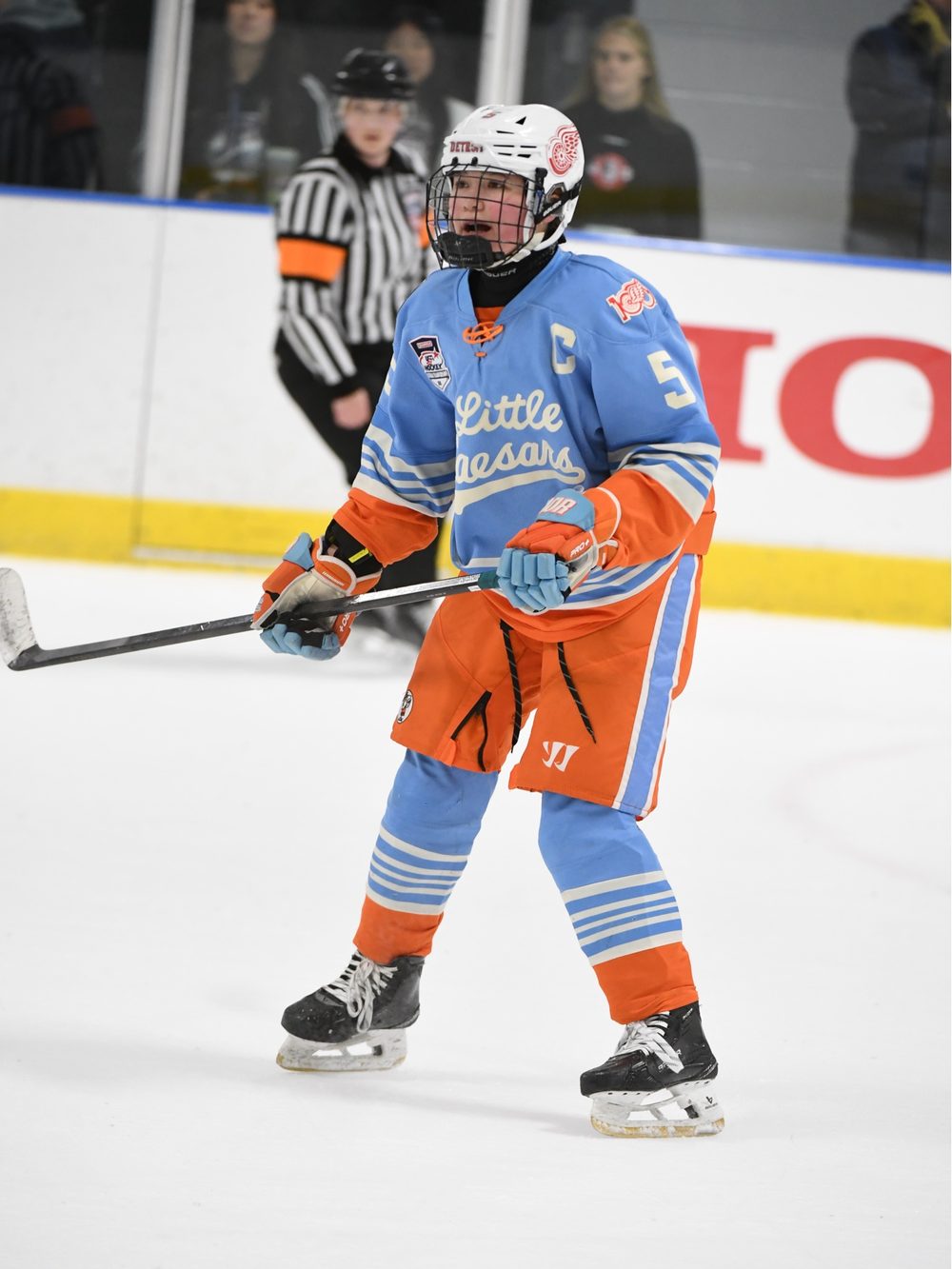 Cameron Cadena wearing the captain's C for Detroit Little Caesars